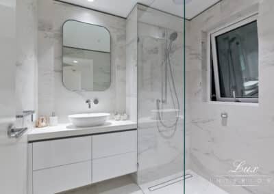 bathroom shower and vanity