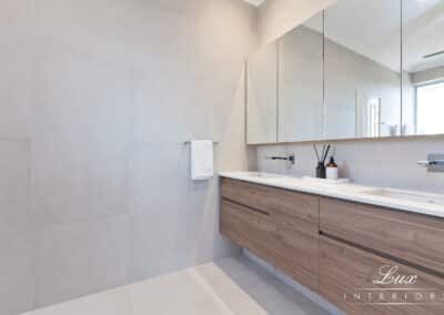 Watermans bathroom vanity and towel rack