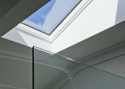 skylight beaming light down into luxury shower