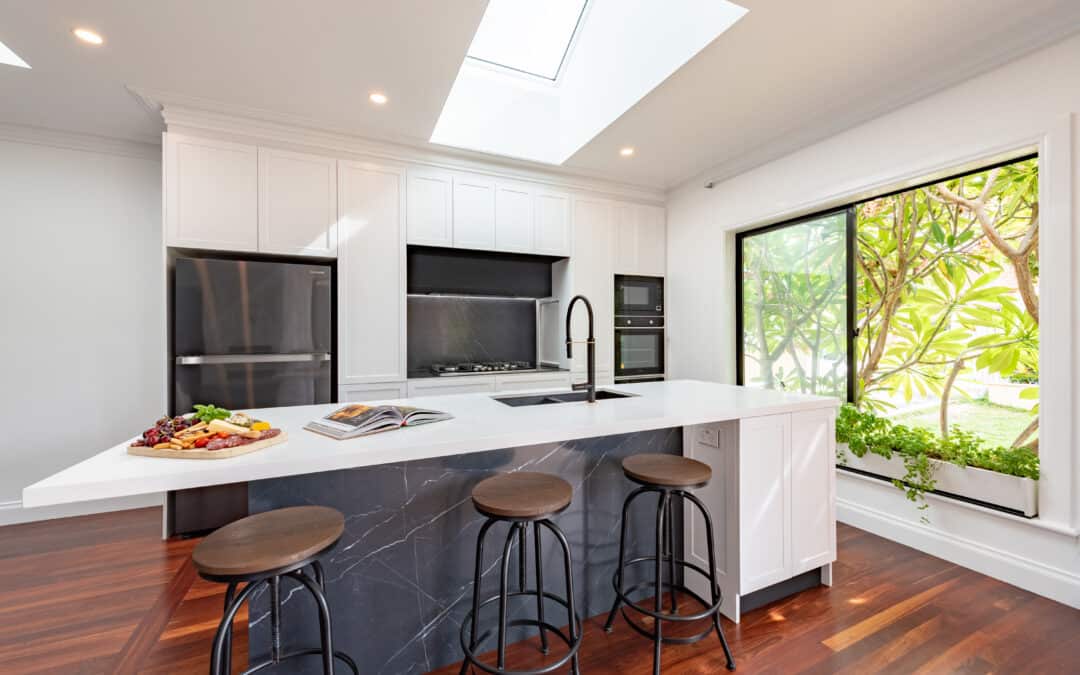 bright and light-filled kitchen with white countertops