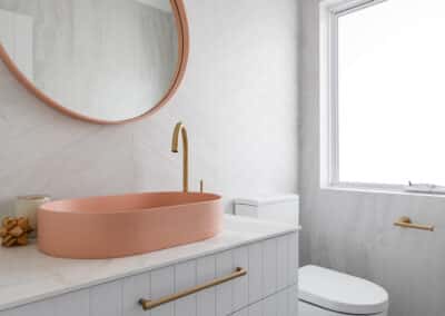 North beach coastal barn powder room- vanity, mirror, basin and tiolet