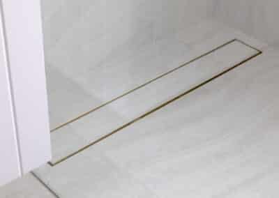 North beach coastal barn ensuite - shower strip drain