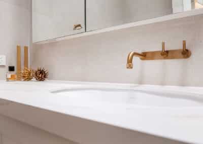 Mount Lawley Traditional Skylit Ensuite - Close up of vanity with brass tapware