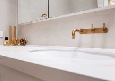 Mount lawley traditional skylit ensuite - close up of vanity with brass tapware