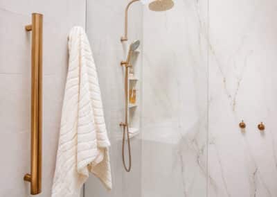 Mount Lawley Traditional Skylit Ensuite - Heated vertical towel rails and shower in brass