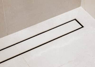 Mount lawley traditional skylit ensuite - strip drain with tile insert