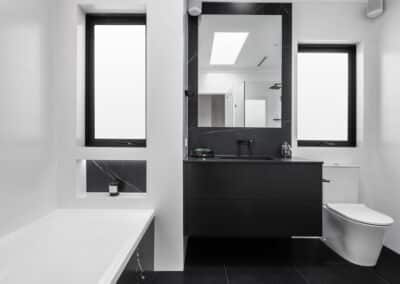 Monochrome main bathroom overview