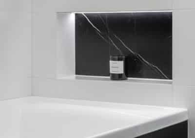 Monochrome Main Bathroom bath niche