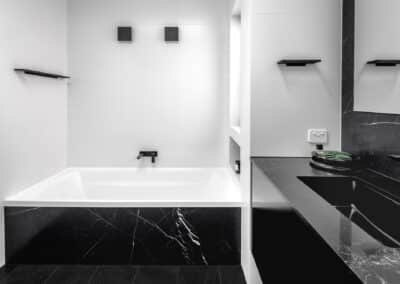 Monochrome main bathroom bath