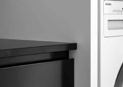 Monochrome laundry cabinetry details