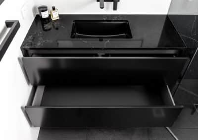 Monochrome Ensuite black vanity with black stone benchtop