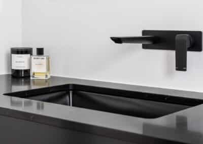 Monochrome Ensuite black tapware black basin