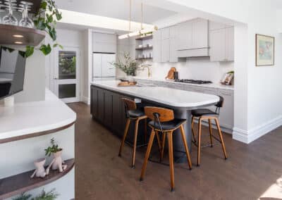 Contemporary shaker style kitchen with curved island bench