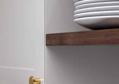 contemporary shaker style kitchen with brass hardware