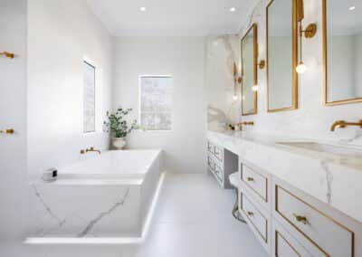 Contemporary bathroom renovation, double vanity with makeup desk, undermount lighting