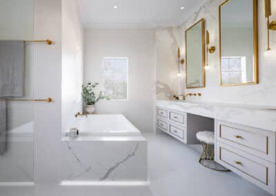 Contemporary bathroom renovation, double vanity with makeup desk, undermount lighting