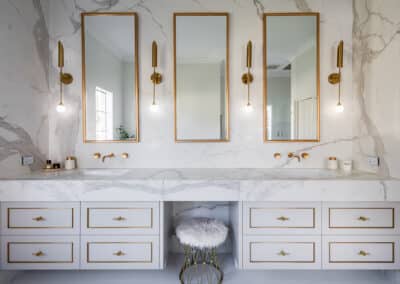 Contemporary bathroom renovation, double vanity with makeup desk, feature lighting