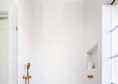 contemporary bathroom renovation, large open shower with brass rain shower head