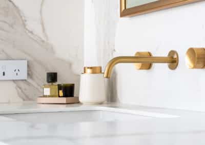 contemporary bathroom renovation, vanity with undermount basins and brass tapware