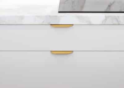 Marble benchtop with brass handles