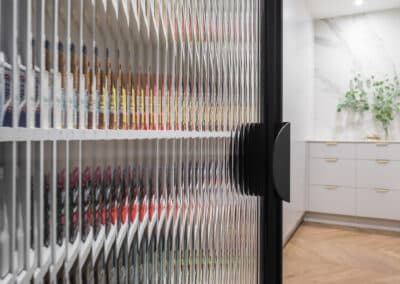 Walk in pantry with fluted arch doorway