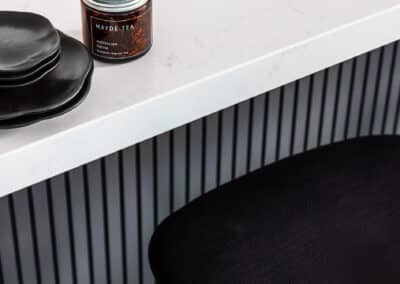Contemporary, monochrome, minimalist kitchen island bench, surround laminex batten
