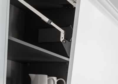 Contemporary absolute matt cabinetry, auto push to open doors