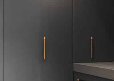 Industrial style kitchen renovation with hidden mini butler's pantry closed