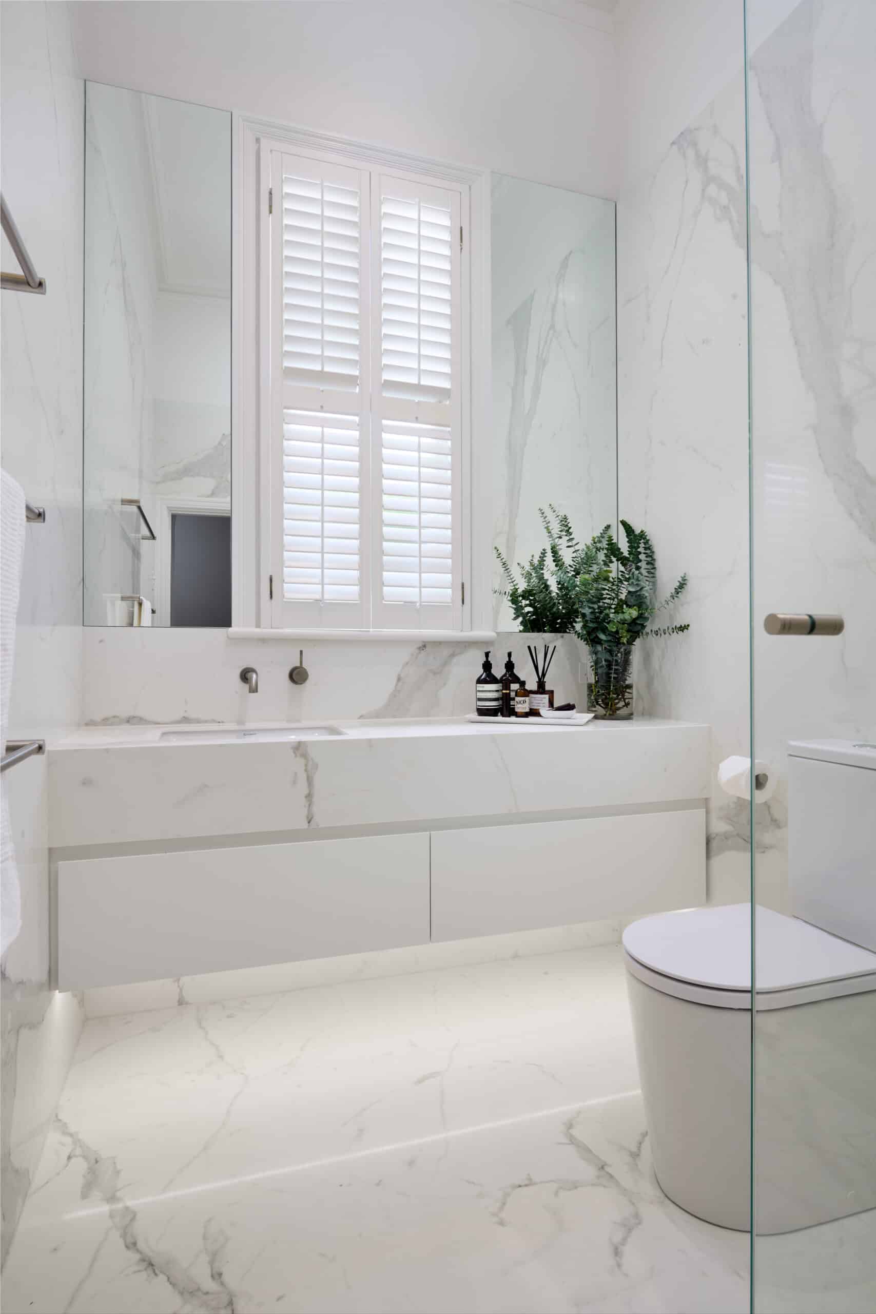 Contemporary marble look downstairs bathroom