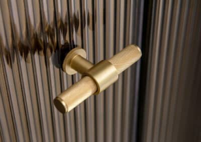 Close up of brass Momo handles