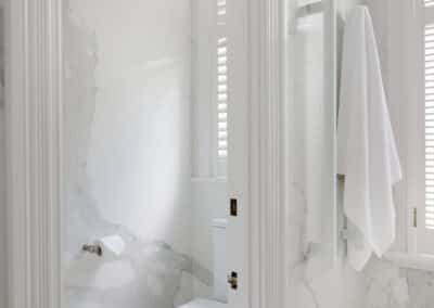 Contemporary marble look with toilet room in bathroom