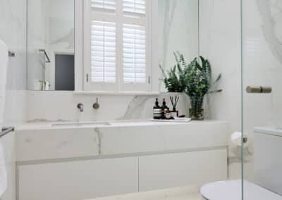 Contemporary marble look downstairs bathroom