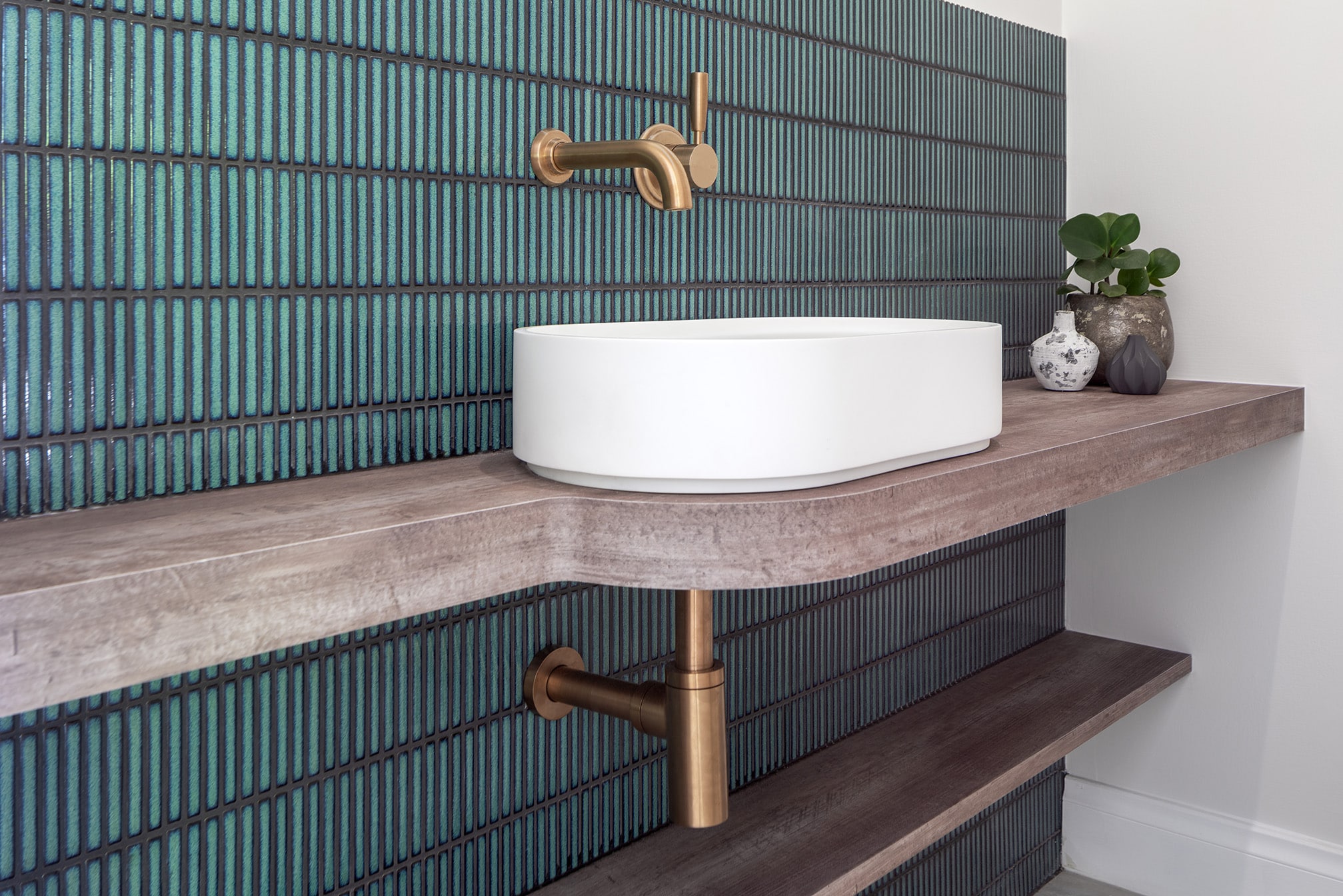 Chelmsford powder room renovation with open vanity, brass tapware and kit kat teal tiles